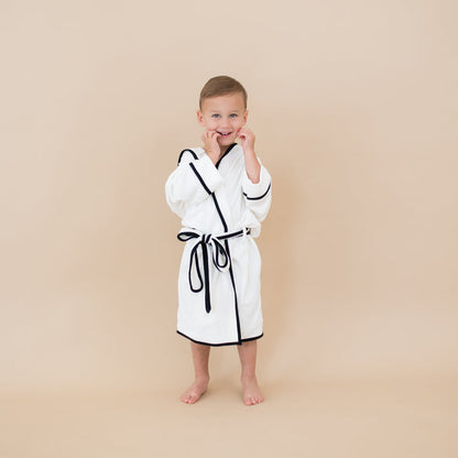 Boy wearing Hooded Bath Robe in Cloud with Midnight Trim