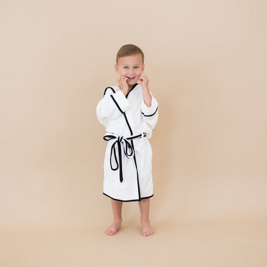 Boy wearing Hooded Bath Robe in Cloud with Midnight Trim