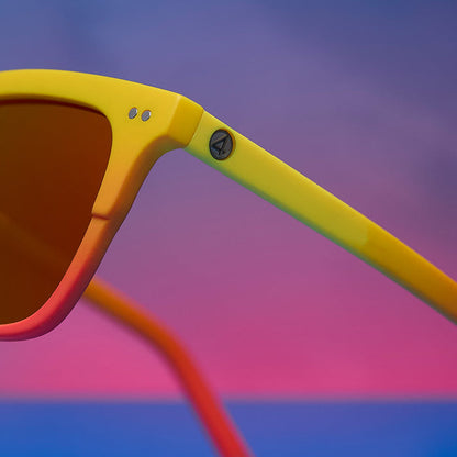 lifestyle - marvel fantastic four x diff eyewear featuring the human torch square sunglasses with a radiant yellow to orange frame fade and blazing red orange mirror polarized lenses detailed view of temple
