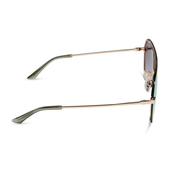 diff eyewear featuring the imani shield sunglasses with a gold frame and cool matcha green mirror lenses side view