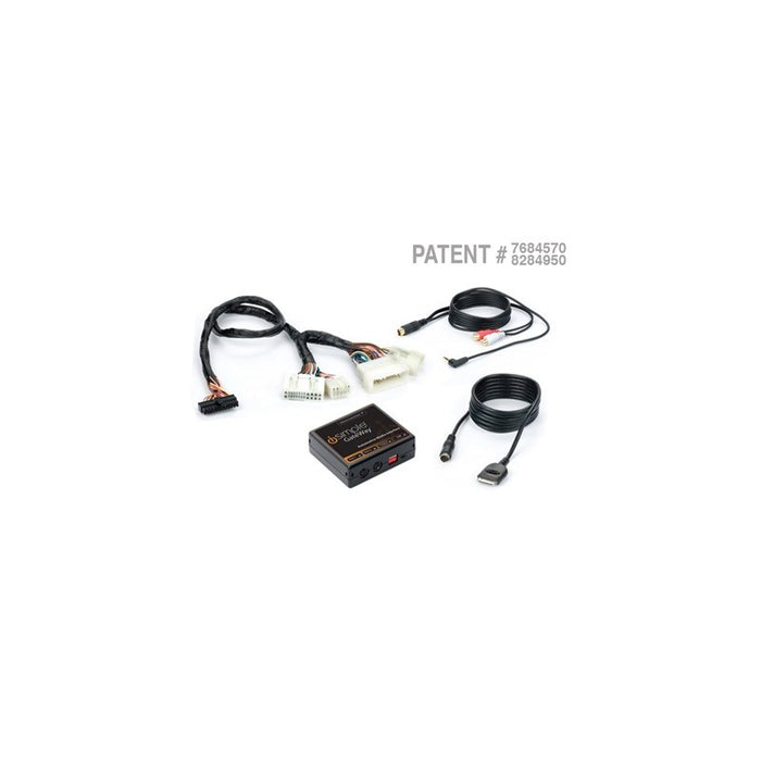 An image showing a vehicle gateway kit consisting of a module, harness, and various connectors.