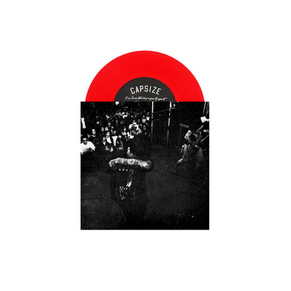 A limited pressing transparent red vinyl from Capsize is partially visible above a black-and-white album cover featuring a tattooed performer singing to a crowd at a live Capsize concert.