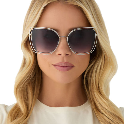 on model - female wearing diff eyewear featuring the jacqueline square sunglasses with a silver frame and grey gradient lenses front view