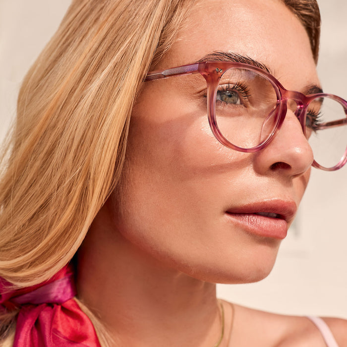 lifestyle - female wearing diff eyewear featuring the jaxson square prescription glasses with a fleur pink tortoise frame detailed view