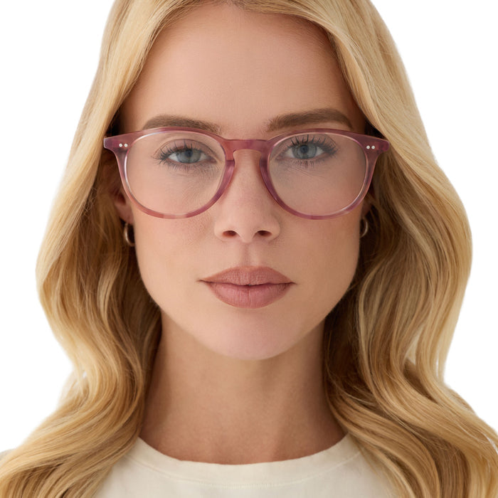 on model - female wearing diff eyewear featuring the jaxson square prescription glasses with a fleur pink tortoise frame front view