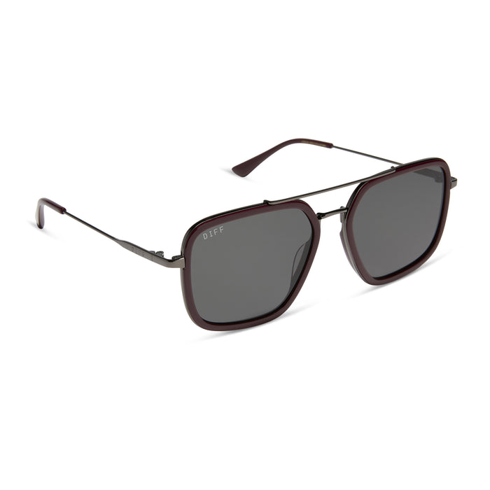 diff eyewear featuring the jordan navigator sunglasses with a dark cherry lacquer frame and grey gradient polarized lenses angled view