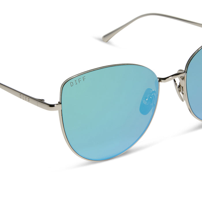 diff eyewear kinsley round sunglasses with a silver metal frame and aquatic awe teal mirror lenses detailed view