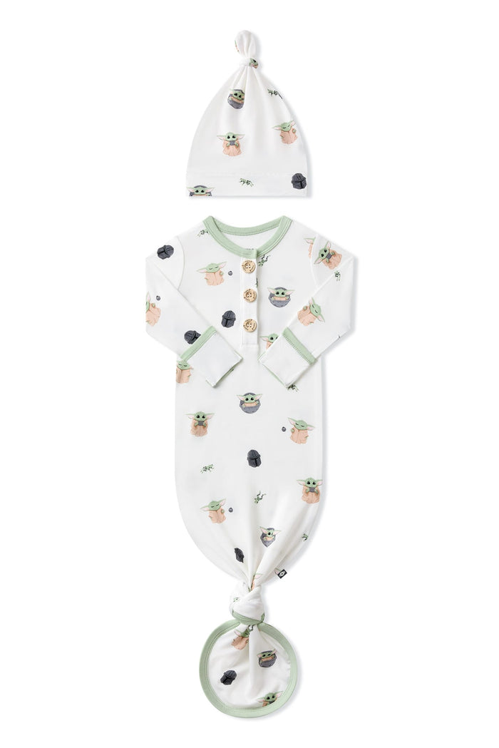 Knotted Gown with Hat Set in Grogu™ with the arms folded inward on a white surface