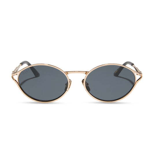 jessie james decker x diff eyewear featuring the limoncello oval sunglasses with a gold frame and grey lenses front view