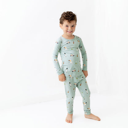 Toddler modeling bamboo Long Sleeve Pajamas in Golf
