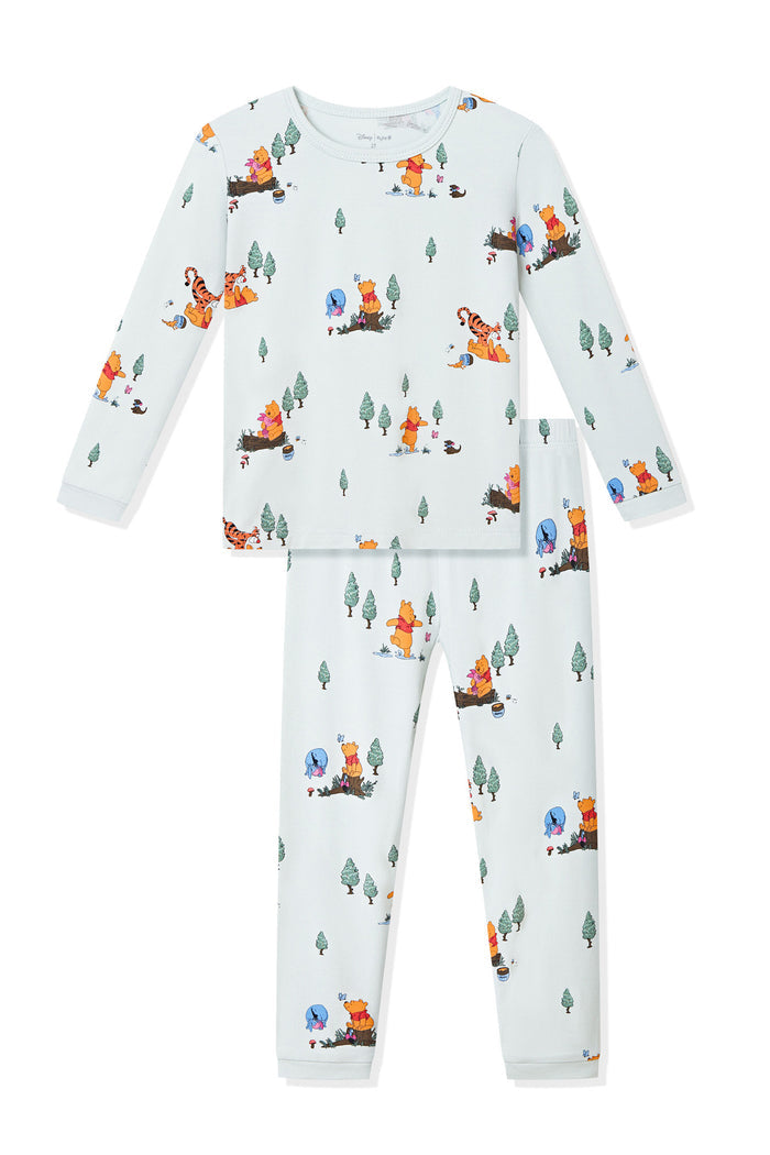 Long Sleeve Pajamas in Winnie the Pooh Hundred Acre Wood print on a white background