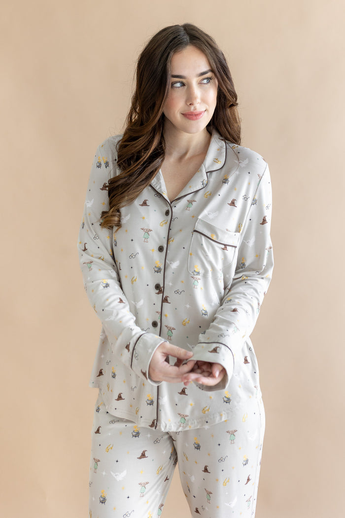 Model wearing a cream Long-Sleeved Women's Pajama Set with Harry Potter prints on a beige background