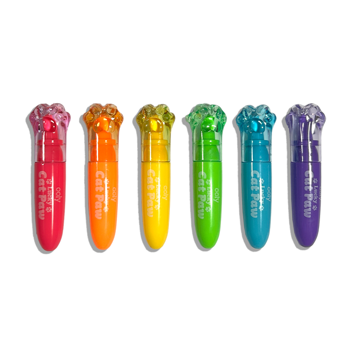 Row of capped OOLY Lucky Cat Paw Scented Neon Highlighters on a white background