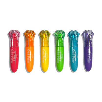 Row of capped OOLY Lucky Cat Paw Scented Neon Highlighters on a white background