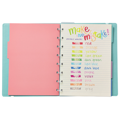Open planner with page reading "Make No Mistake" and color swatches from the OOLY Make No Mistake Erasable Markers