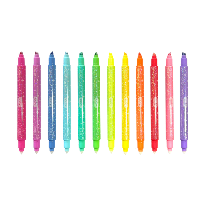 Row of uncapped OOLY Make No Mistake! Glittery Erasable Markers on a white background