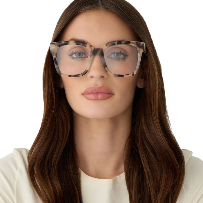 on model - female wearing diff eyewear featuring the meredith square glasses with a cream tortoise frame front view