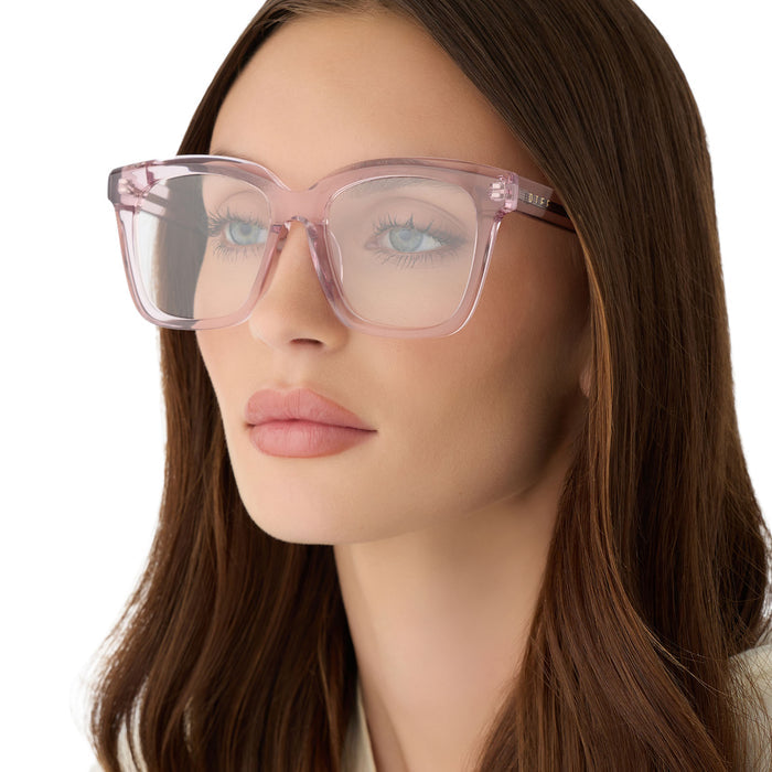 on model - female wearing diff eyewear featuring the meredith square  oversized prescription glasses with a rose crystal frame acetate angled view