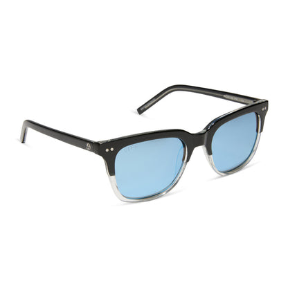 diff eyewear x fantastic four featuring the mr. fantastic square sunglasses with a black to clear frame and quantum blue mirror polarized lenses angled view