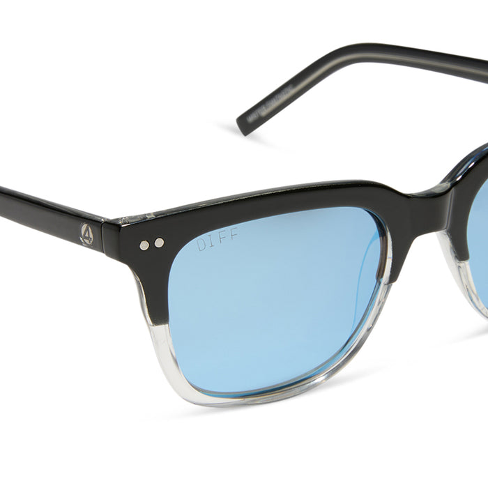 diff eyewear x fantastic four featuring the mr. fantastic square sunglasses with a black to clear frame and quantum blue mirror polarized lenses detailed view