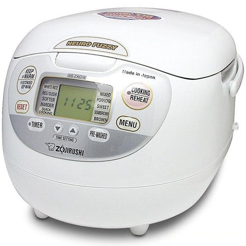 A white Zojirushi rice cooker with a digital display and various cooking settings labeled on the front.