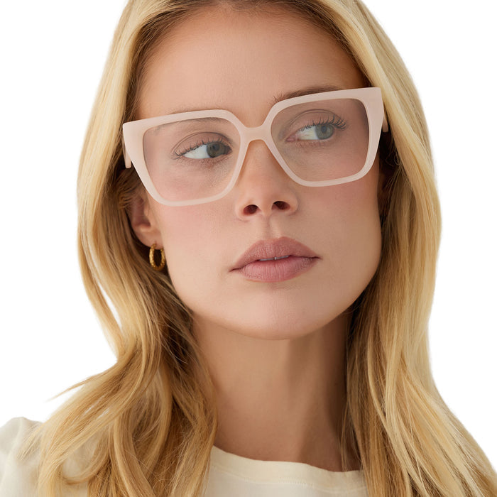 on model - female wearing diff eyewear featuring the olive square prescription glasses with a milky blush acetate frame front view
