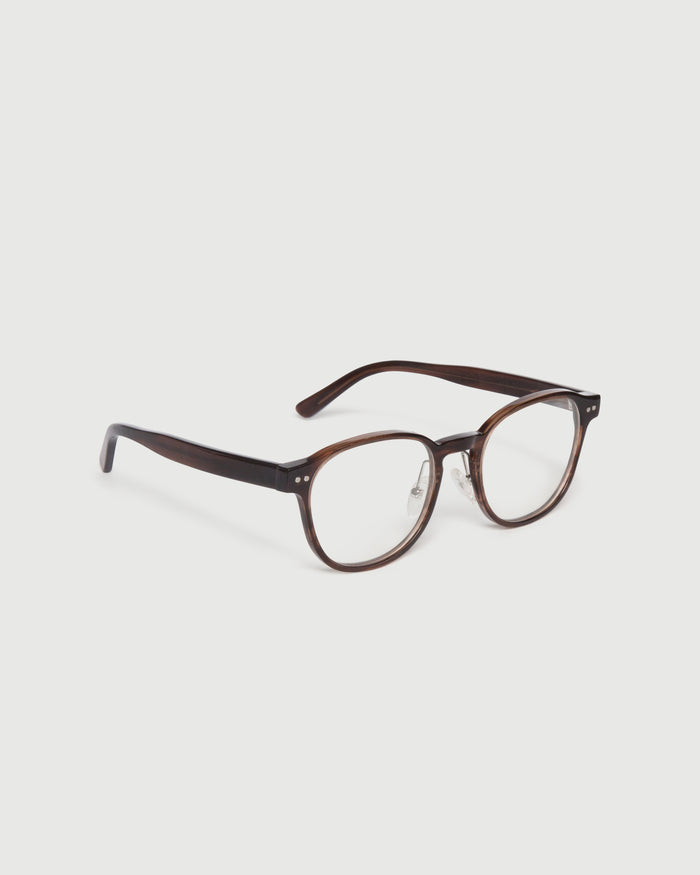 Polished Tort::Orman Eyeglasses round tort acetate front diagonal