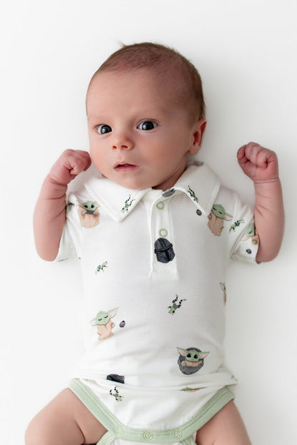 Close up of newborn wearing the Polo Bodysuit in Grogu™
