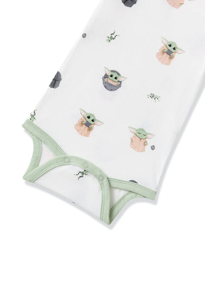 Close up of the snap closure and green trim on the Polo Bodysuit in Grogu™
