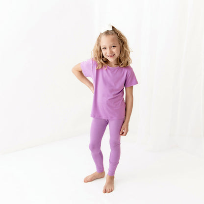 Girl wearing Ribbed Leggings in Poi with matching shirt