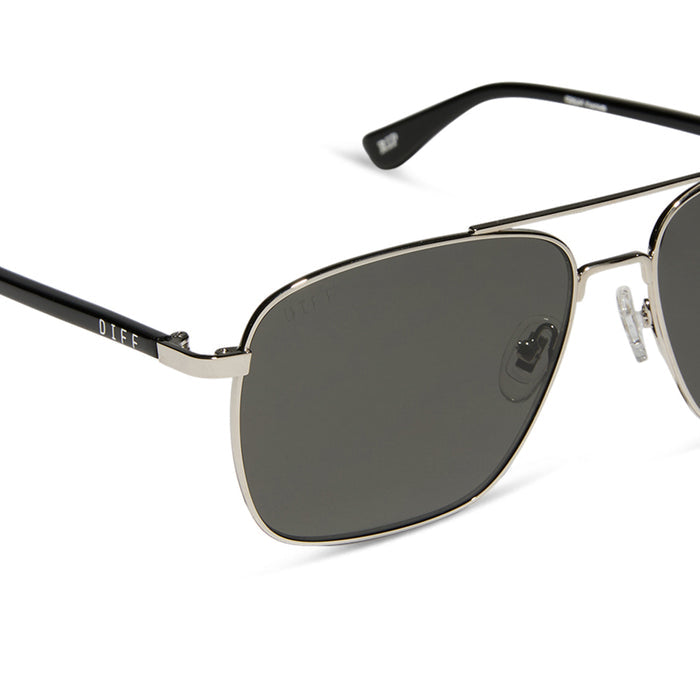 yellowstone x diff eyewear featuring the rip wheeler navigator sunglasses with a silver frame and grey polarized lenses detailed view