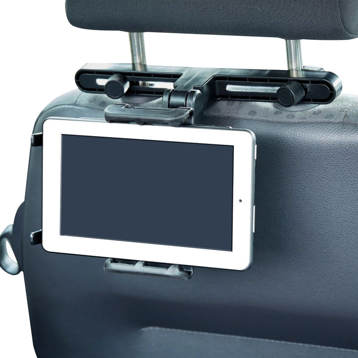 white ipad mounted behind driver headrest