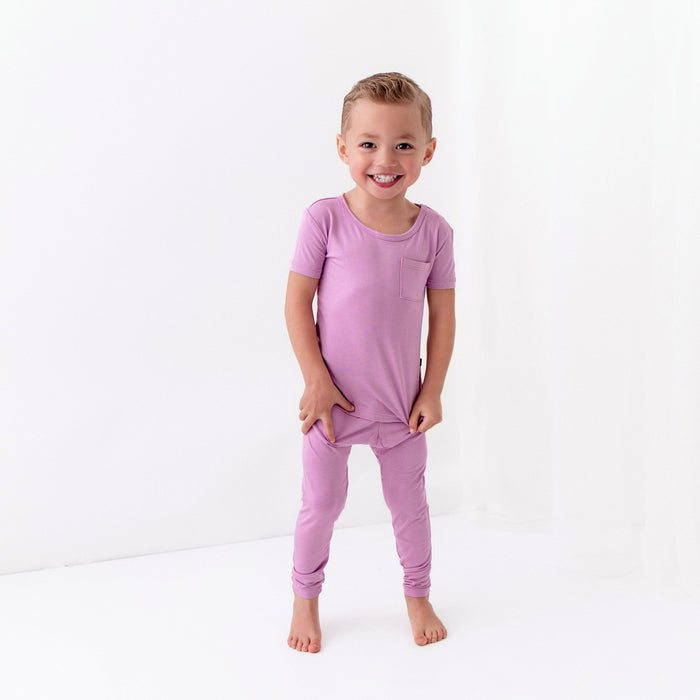 Toddler wearing Short Sleeve Pajamas with Pants in Poi pink