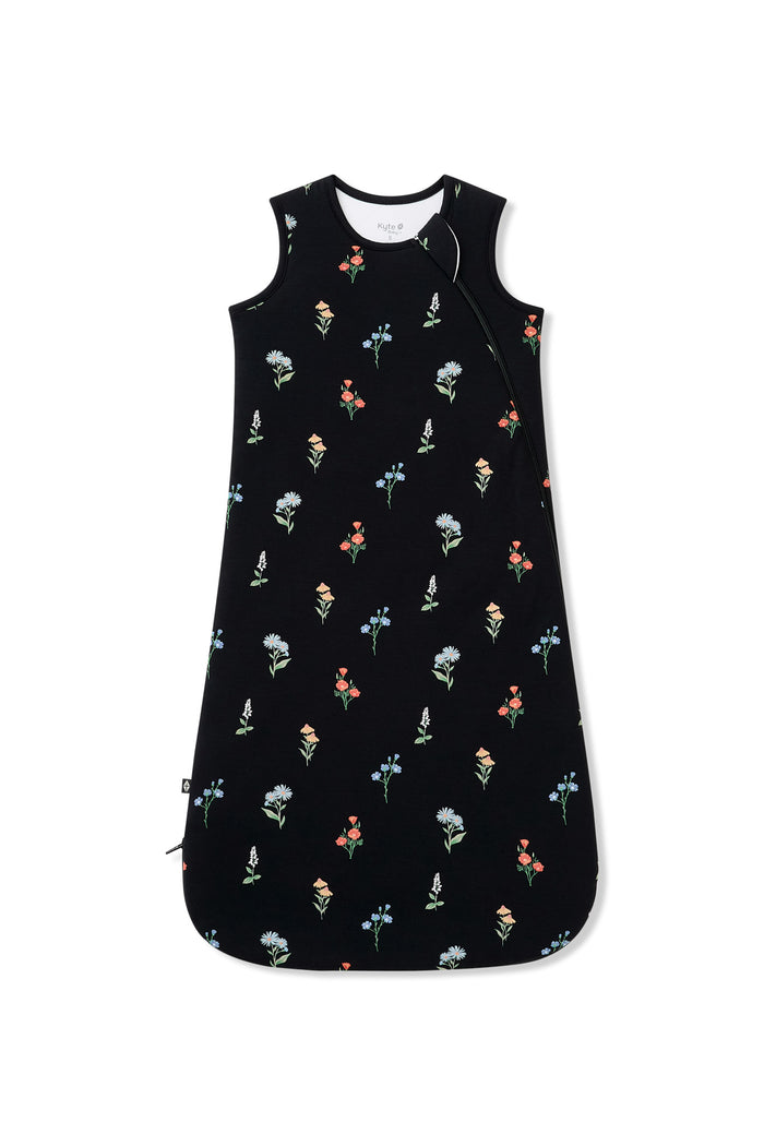 Black Sleep Bag with Wildflower 1.0 print on a white background
