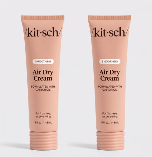 Two tubes of Kitsch Smoothing Air Dry Cream formulated with castor oil, 5 fl. oz. (148 mL), displayed side by side on a white background for frizz-free, air-dry styling.