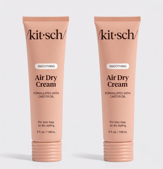 Two tubes of Kitsch Smoothing Air Dry Cream formulated with castor oil, 5 fl. oz. (148 mL), displayed side by side on a white background for frizz-free, air-dry styling.