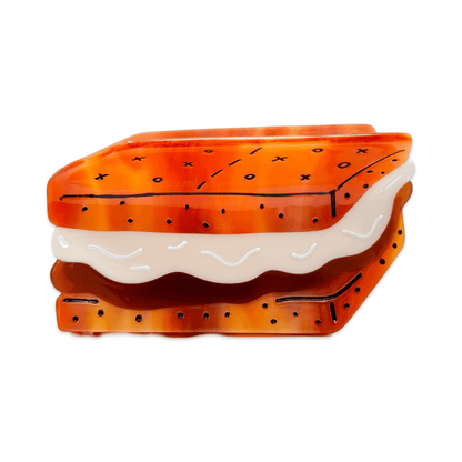 A s'mores shaped hair clip in collaboration with famous hair clip designer Jenny Lemons and gourmet marshmallow creators, XO Marshmallow.