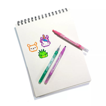Stamp-A-Square Double Ended Markers resting on sketchbook with stamp artwork