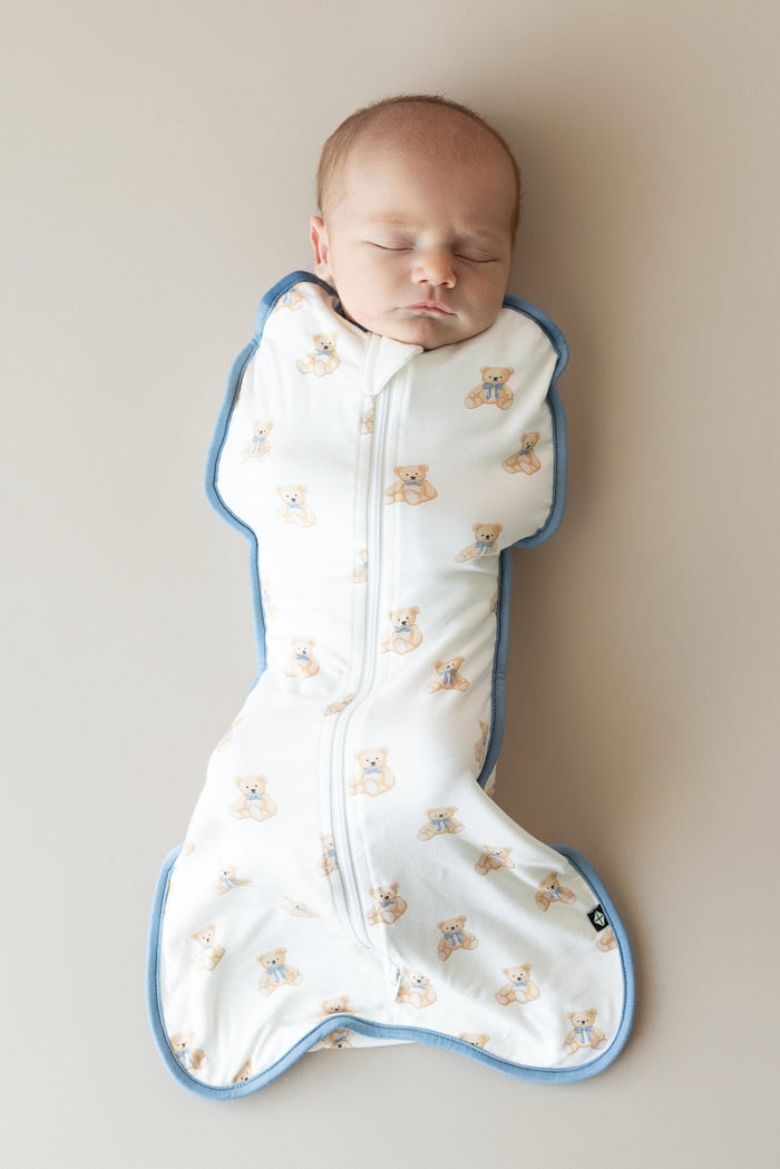 Baby sleeping in Kyte Baby Swaddle Bag in Teddy Bear 0.5