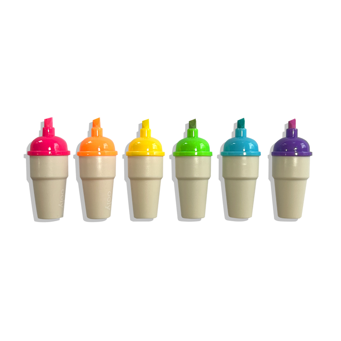 Row of 6 uncapped OOLY Sweet Scoops Scented Neon Highlighters on a white background