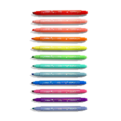 Row of uncapped markers from OOLY Switch-Eroo Sparkle Glittery Color Changing Markers