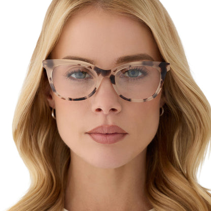on model - female wearing diff eyewear featuring the sylvia cat eye prescription glasses with a cream tortoise frame front view
