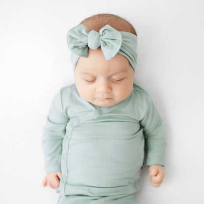 Baby sleeping in Bamboo Take Me Home Hospital Set with Bow in Sage