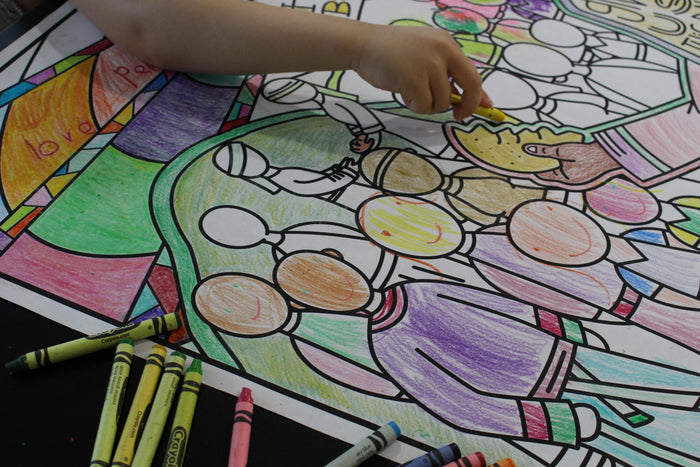 Coloring a poster of the Lord's Prayer