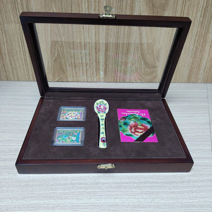 The Singapore Mint Peranakan collection stamp and spoon