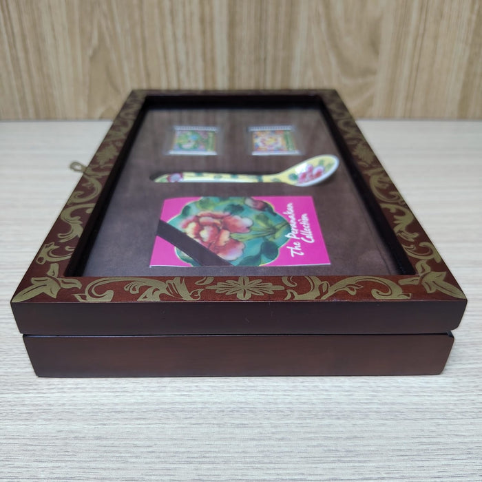 The Singapore Mint Peranakan collection stamp and spoon