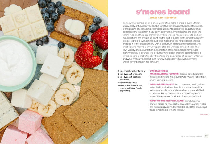 S'mores board with graham crackers, marshmallows, bananas, strawberries, and blueberries on a white plate.
