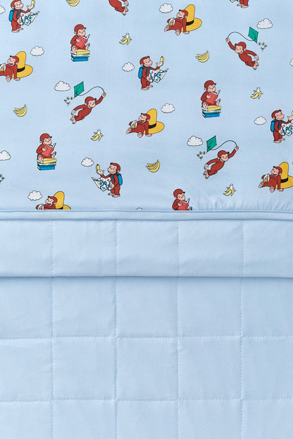 Front and back of Blue Toddler Blanket in Curious George 1.0 print