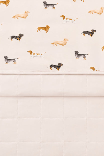 Front and Back of Beige Toddler Blanket in Dachshund print