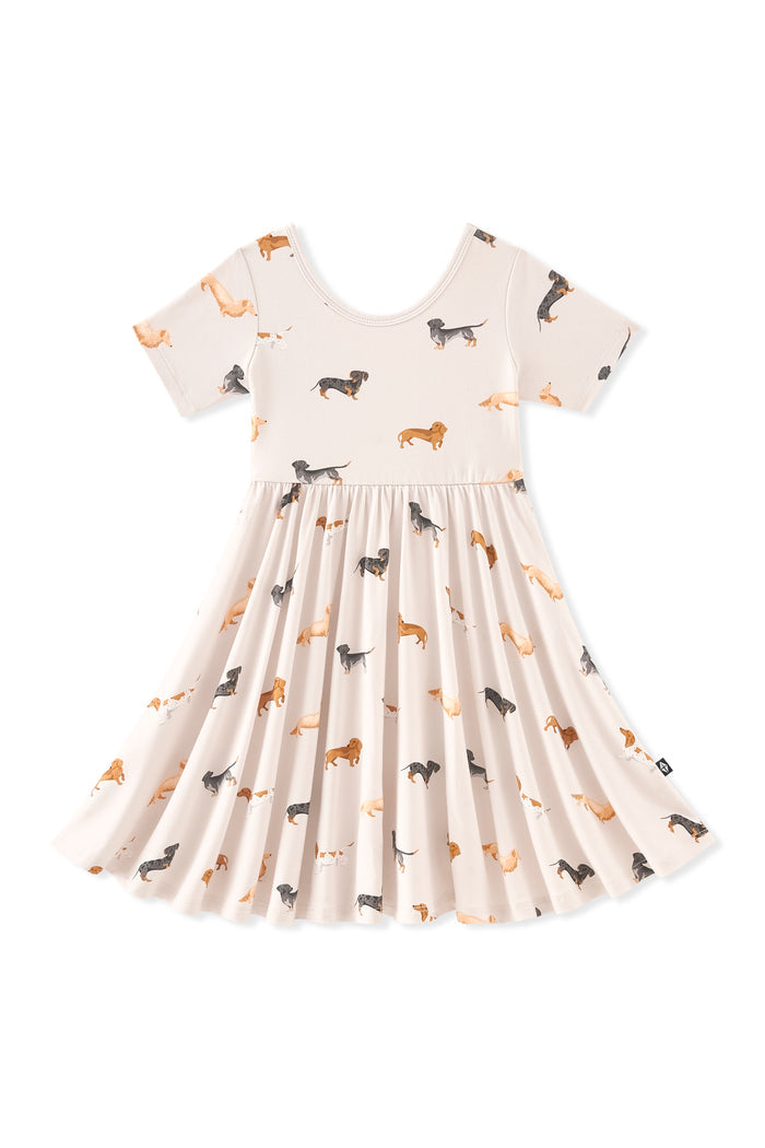 Beige Twirl Dress in Dachshund print on a white background